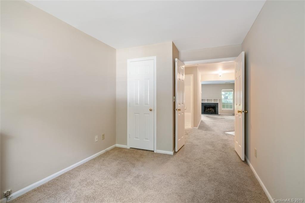 20109 Henderson Road, Unit A Cornelius, NC 28031 - Photo 20 of 25 a view of an empty room and window