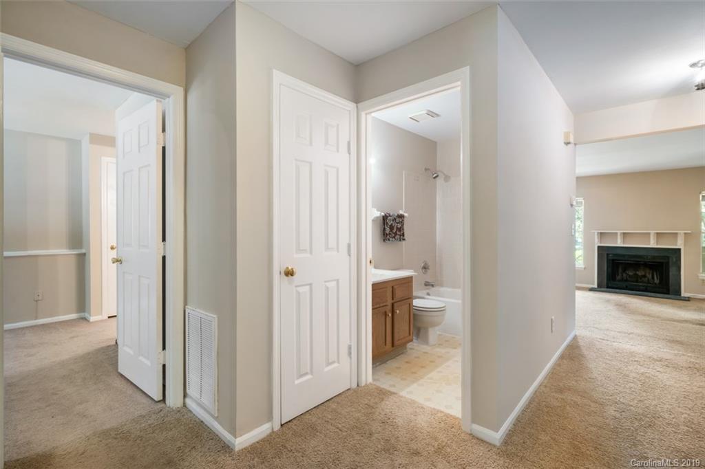 20109 Henderson Road, Unit A Cornelius, NC 28031 - Photo 7 of 25 a view of a bathroom from the hallway