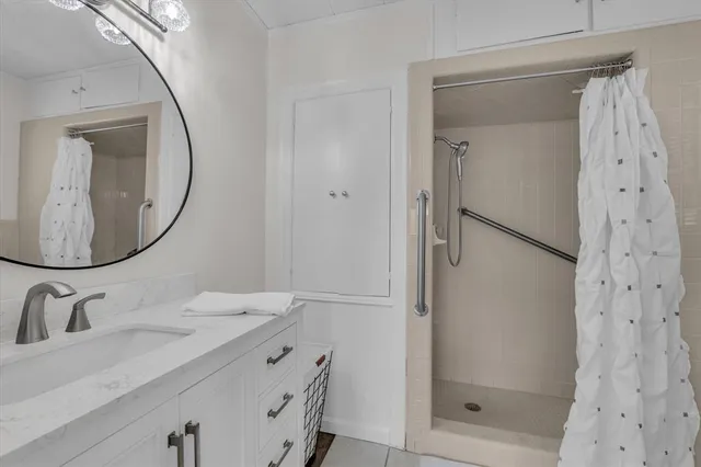a bathroom with a sink and a mirror