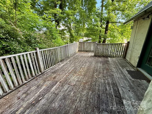 a view of a wooden fence