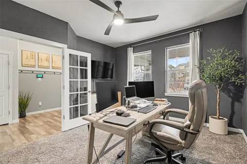 a view of a livingroom with furniture and a table