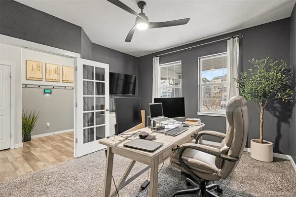 a view of a livingroom with furniture and a table