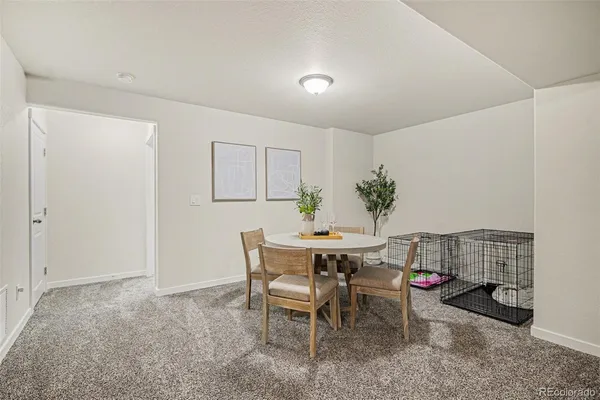 a view of a dining room with furniture