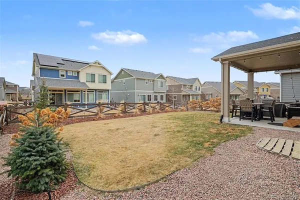 a view of a yard with furniture