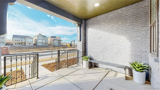 a view of balcony with a potted plant