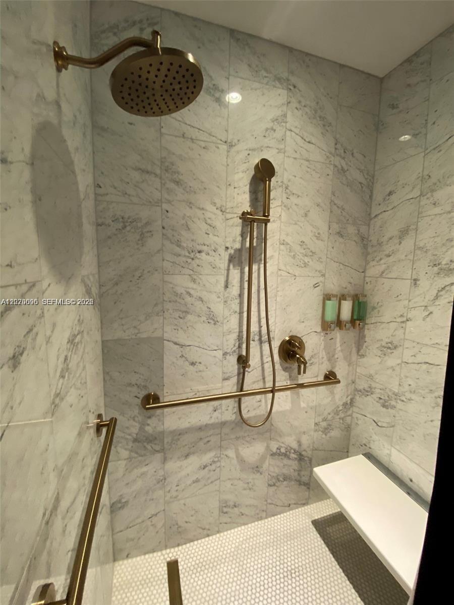 788 Northeast 23rd Street, Unit 1202 Miami, FL 33137 - Photo 59 of 64 a bathroom with a shower