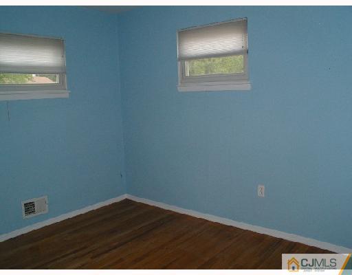 188 North Hill Road Colonia, NJ 07067 - Photo 7 of 10 an empty room with a window