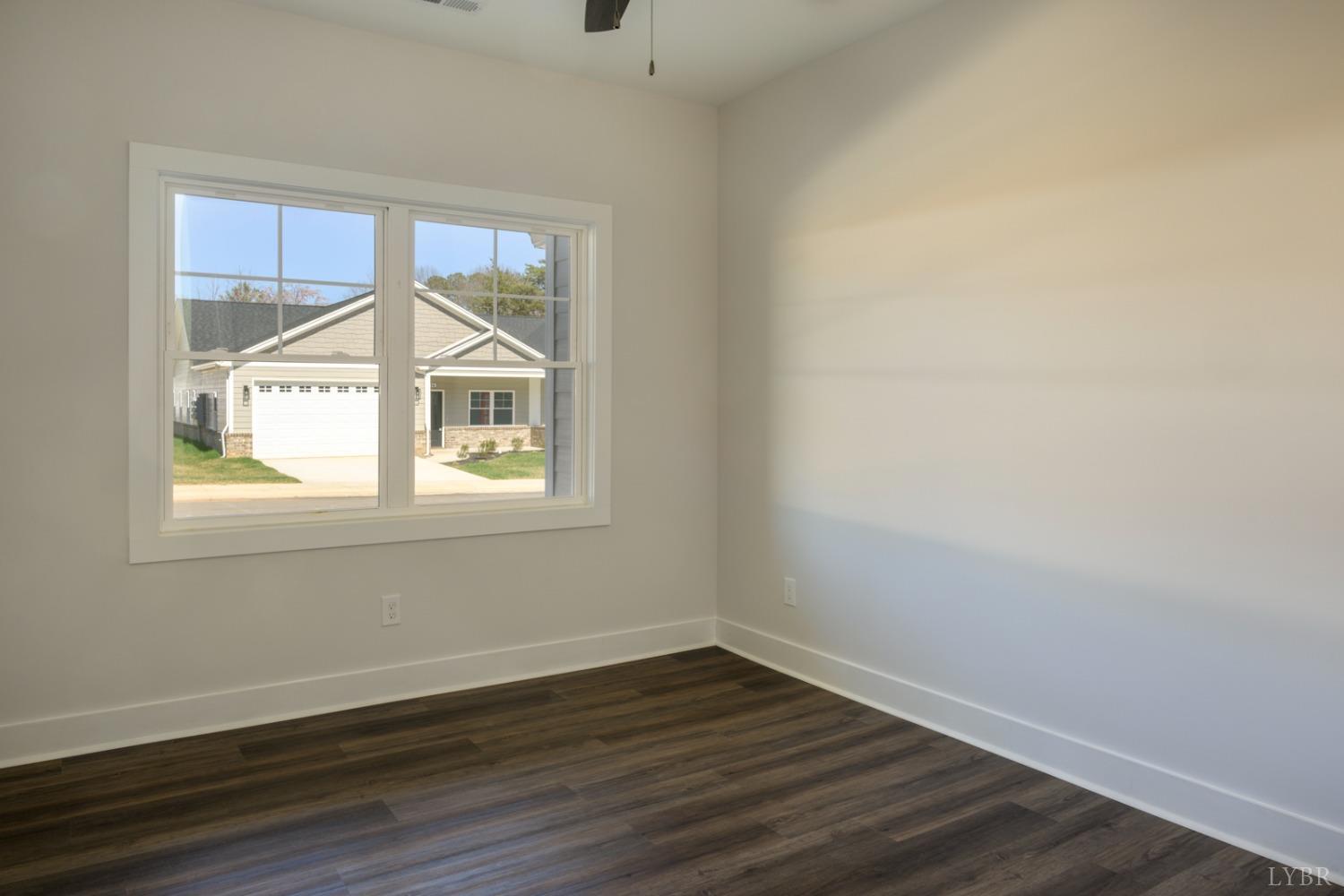 125 Lockridge Lane Lynchburg, VA 24502 - Photo 19 of 28 wooden floor in an empty room with a window