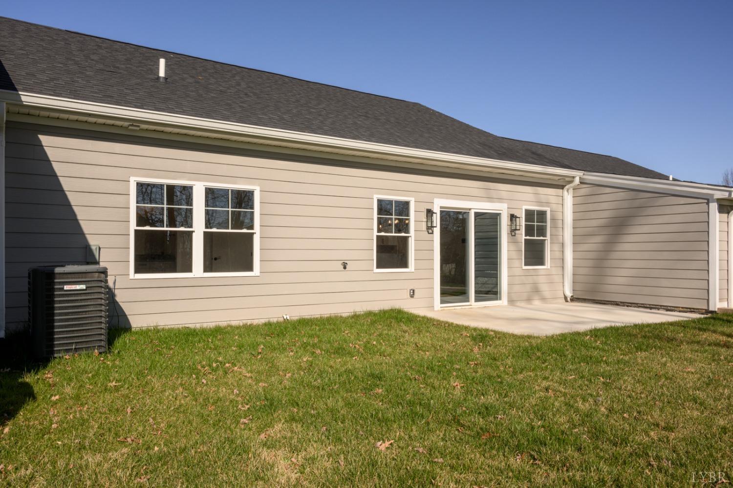 125 Lockridge Lane Lynchburg, VA 24502 - Photo 2 of 28 a front view of a house with a garden