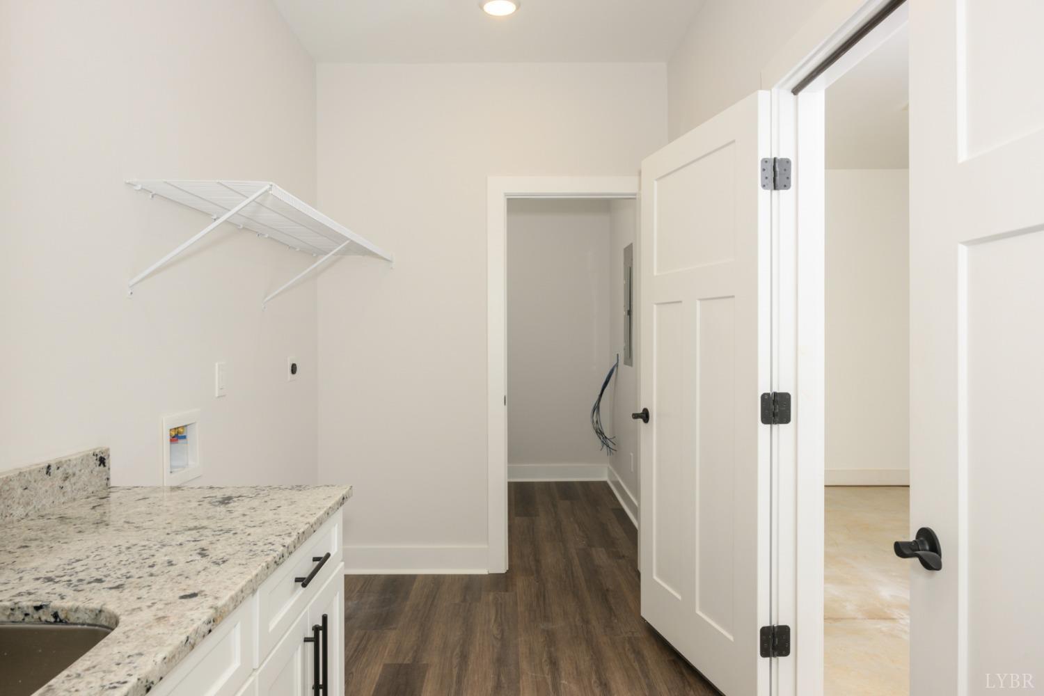 125 Lockridge Lane Lynchburg, VA 24502 - Photo 21 of 28 a bathroom with a granite countertop sink a mirror and shower