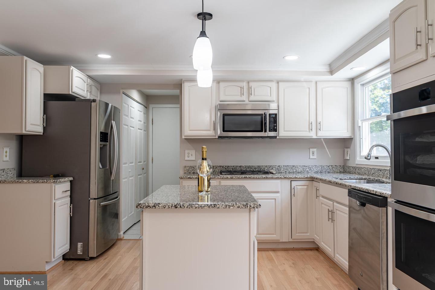 14913 Lear Lane Silver Spring, MD 20905 - Photo 7 of 33 Modern kitchen with sleek finishes.