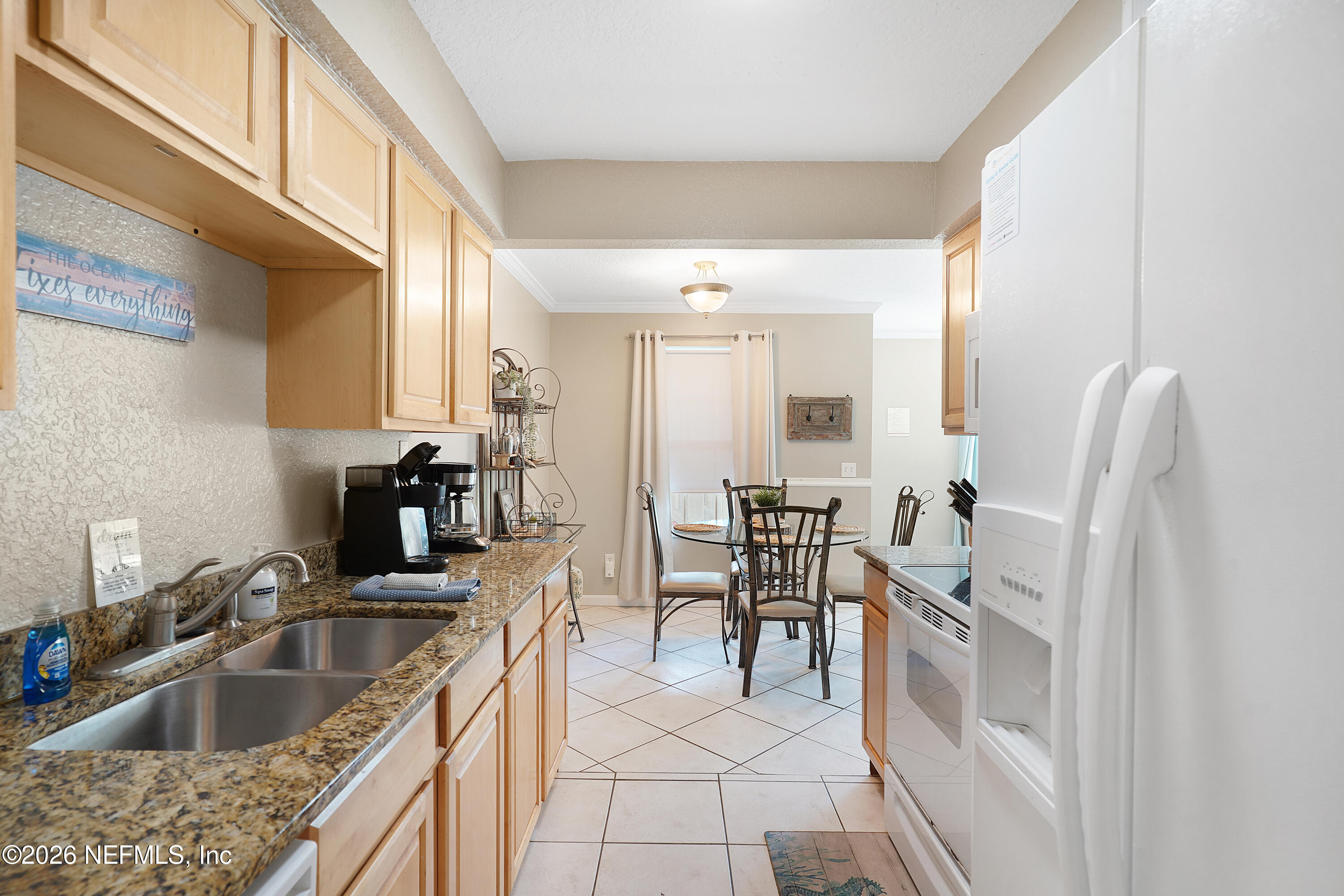 9 Clipper Court St. Augustine, FL 32080 - Photo 9 of 22 a kitchen with a sink cabinets and counter space