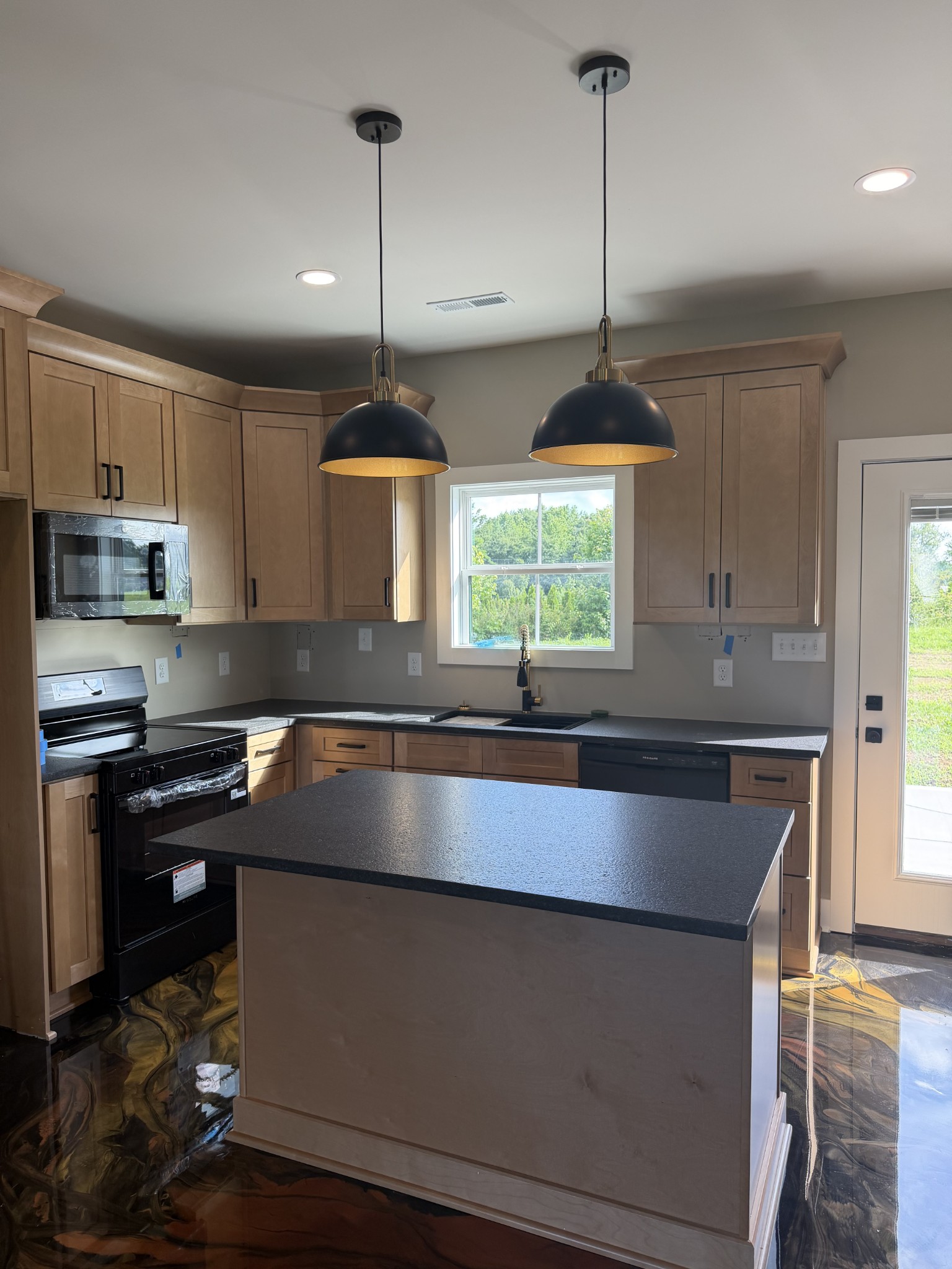 4901 Old Salem Lexie Road Belvidere, TN 37306 - Photo 4 of 12 a kitchen with kitchen island a counter space a sink and a window