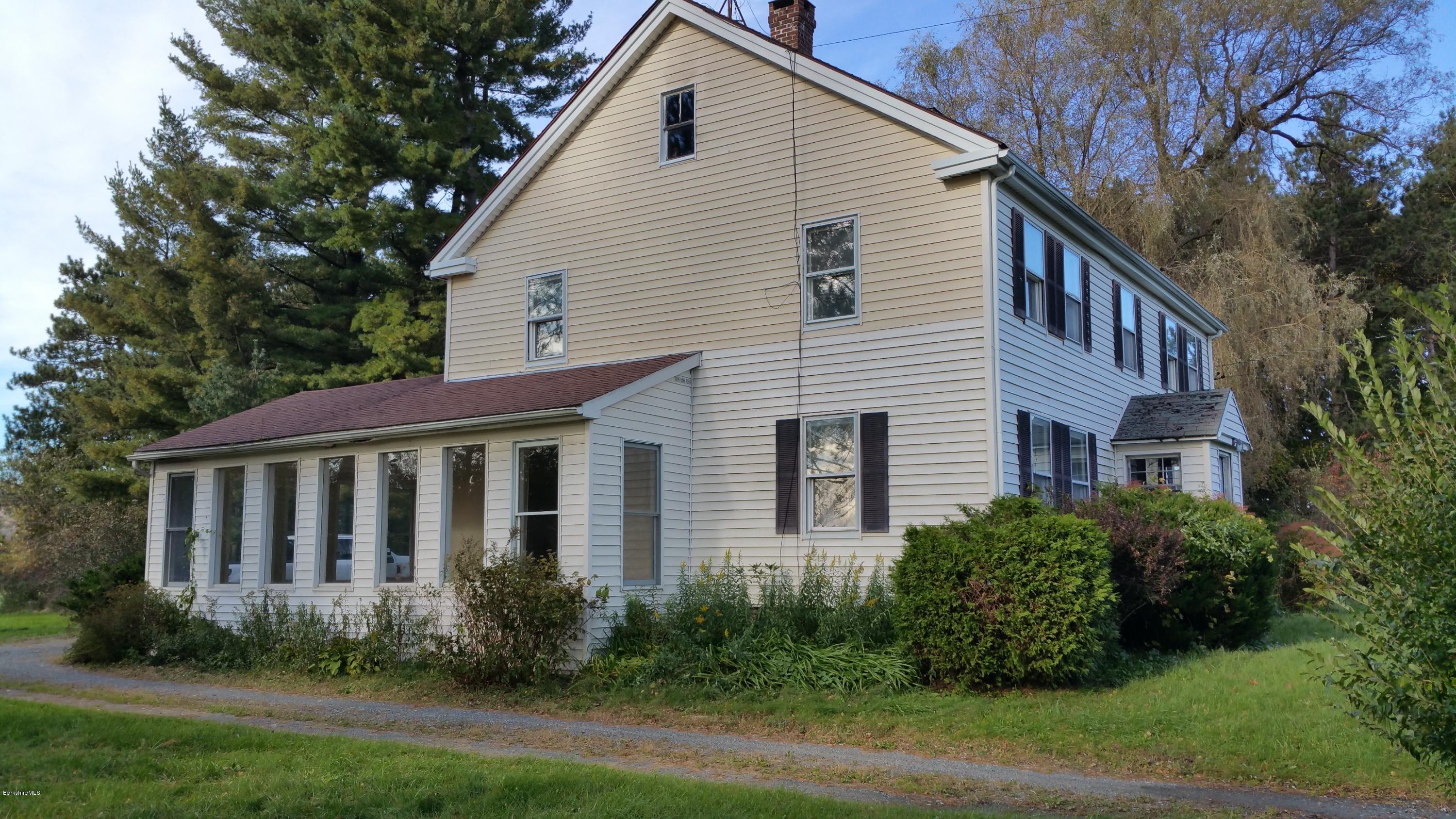 198 State Road Richmond, MA 01201 - Photo 3 of 27 a view of a house with backyard and garden
