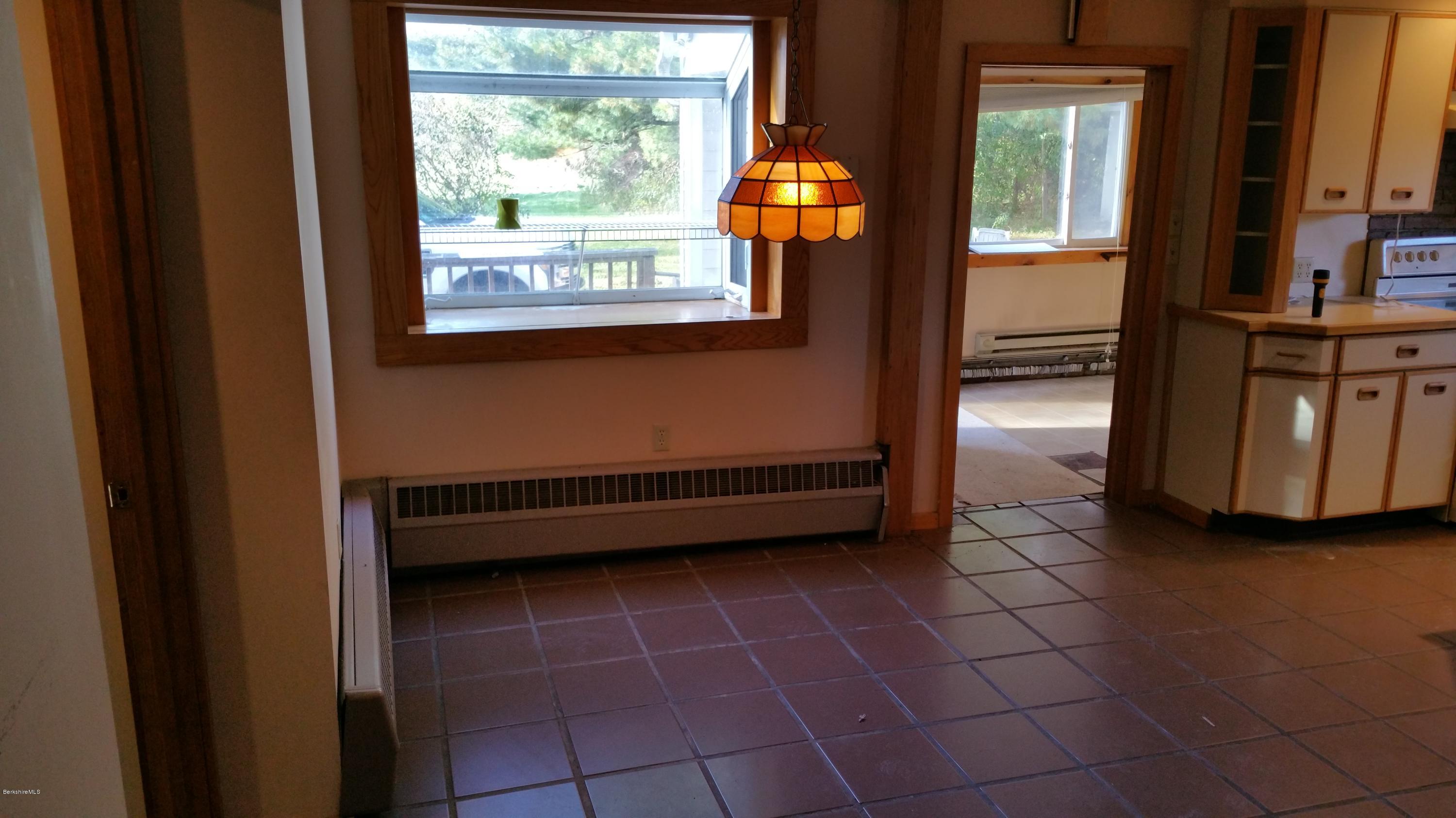 198 State Road Richmond, MA 01201 - Photo 7 of 27 a room with a window and a table