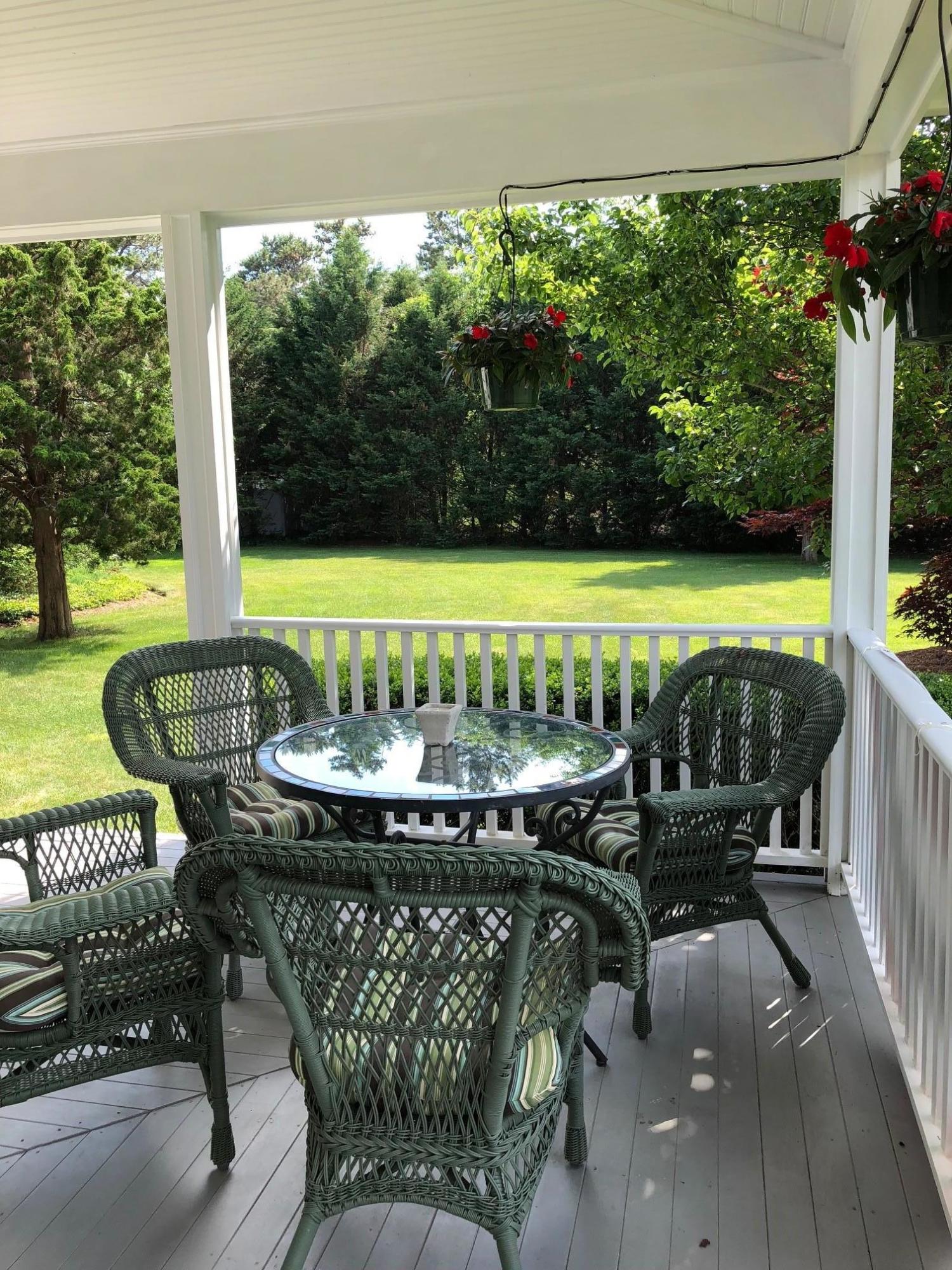 47 Boulder Brook Road East Sandwich, MA 02537 - Photo 32 of 50 Front Porch with Table