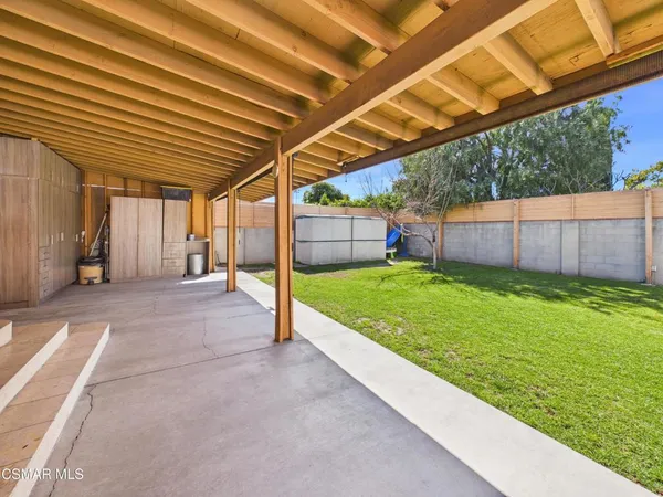 a view of a backyard with a garden