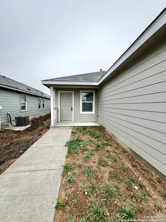 a house view with a backyard space