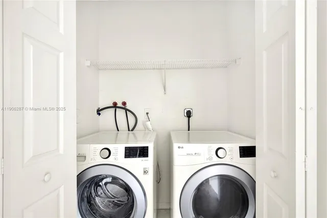 a utility room with dryer and washer
