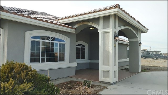 a front view of a house with a porch