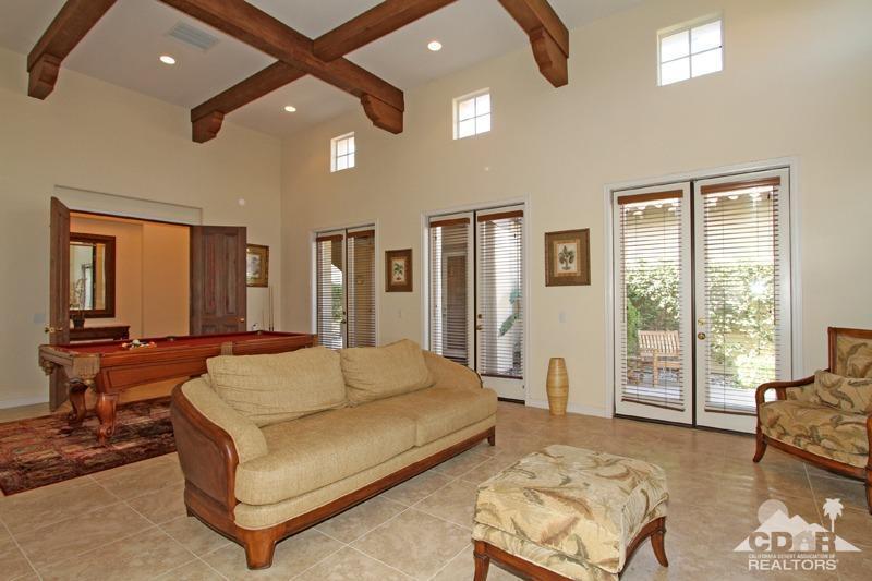 346 Loch Lomond Road Rancho Mirage, CA 92270 - Photo 17 of 34 a living room with furniture and a large window