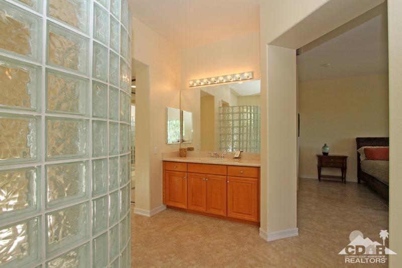 346 Loch Lomond Road Rancho Mirage, CA 92270 - Photo 20 of 34 a room with a chair and a large window