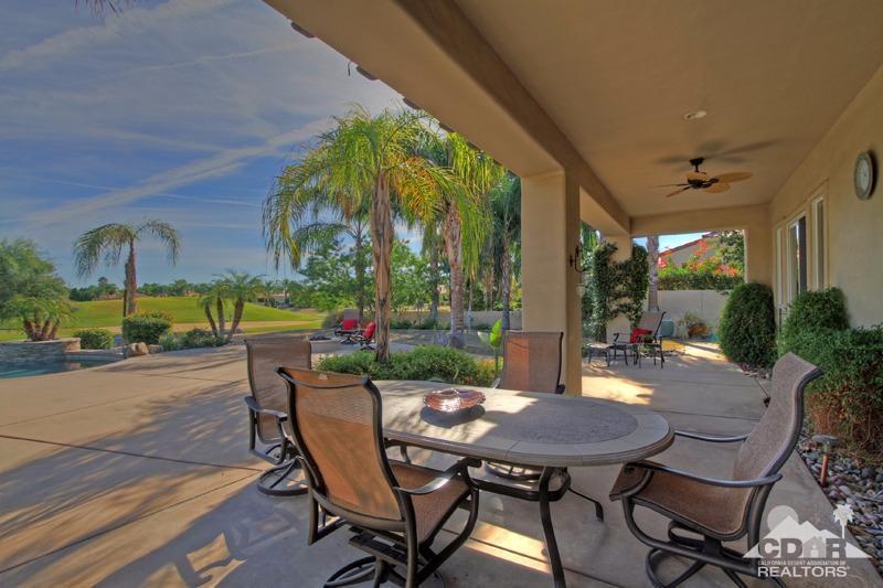 346 Loch Lomond Road Rancho Mirage, CA 92270 - Photo 26 of 34 a view of a patio with a table and chairs