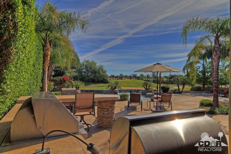 346 Loch Lomond Road Rancho Mirage, CA 92270 - Photo 28 of 34 a view of a swimming pool with outdoor seating and plants