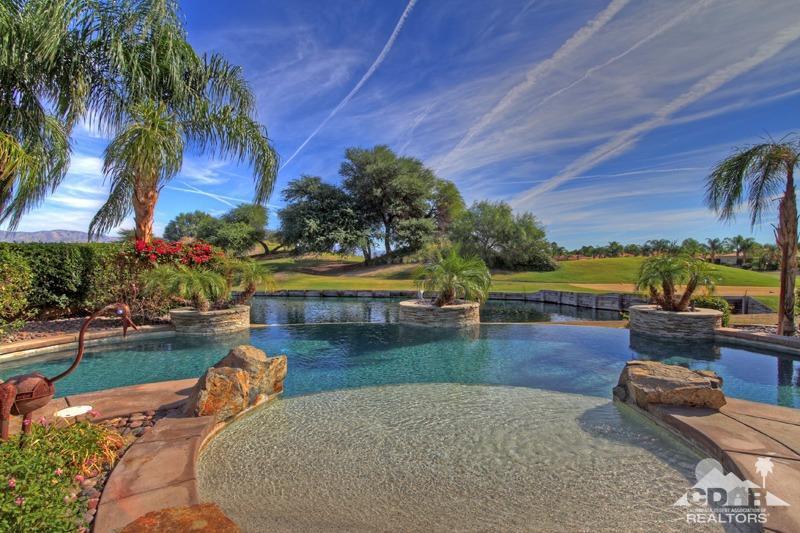 346 Loch Lomond Road Rancho Mirage, CA 92270 - Photo 29 of 34 a view of a swimming pool with a patio