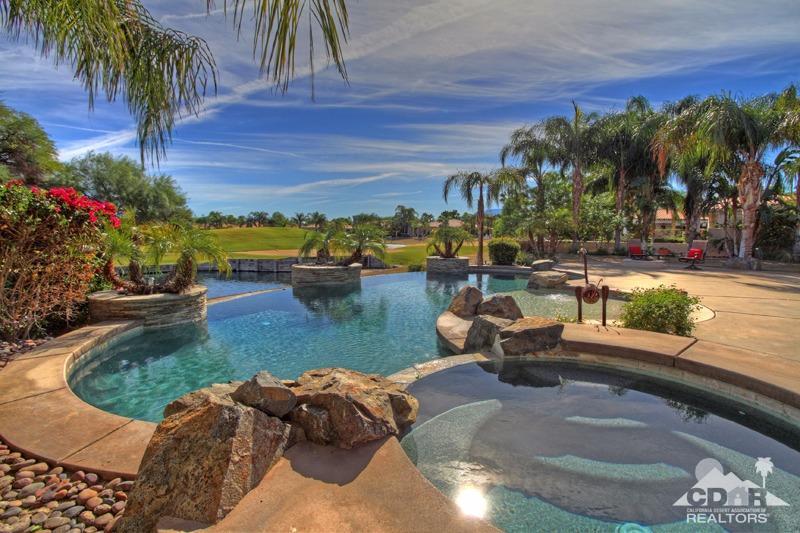 346 Loch Lomond Road Rancho Mirage, CA 92270 - Photo 3 of 34 a view of a swimming pool with a patio