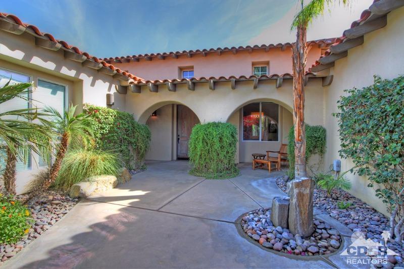 346 Loch Lomond Road Rancho Mirage, CA 92270 - Photo 5 of 34 a front view of a house with garden