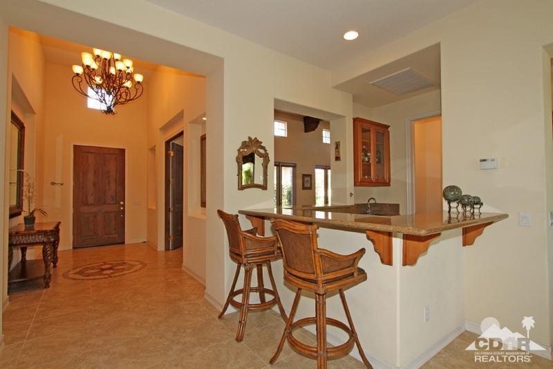 346 Loch Lomond Road Rancho Mirage, CA 92270 - Photo 9 of 34 a view of a dining room with furniture and a chandelier
