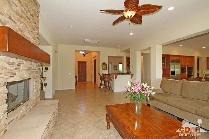 346 Loch Lomond Road Rancho Mirage, CA 92270 - Photo 10 of 34 a living room with furniture and a fireplace