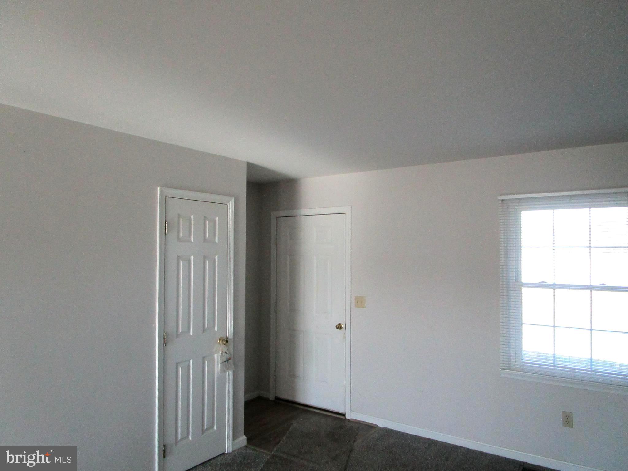 1672 Vernon Road Harrington, DE 19952 - Photo 8 of 37 Foyer & Coat Closet