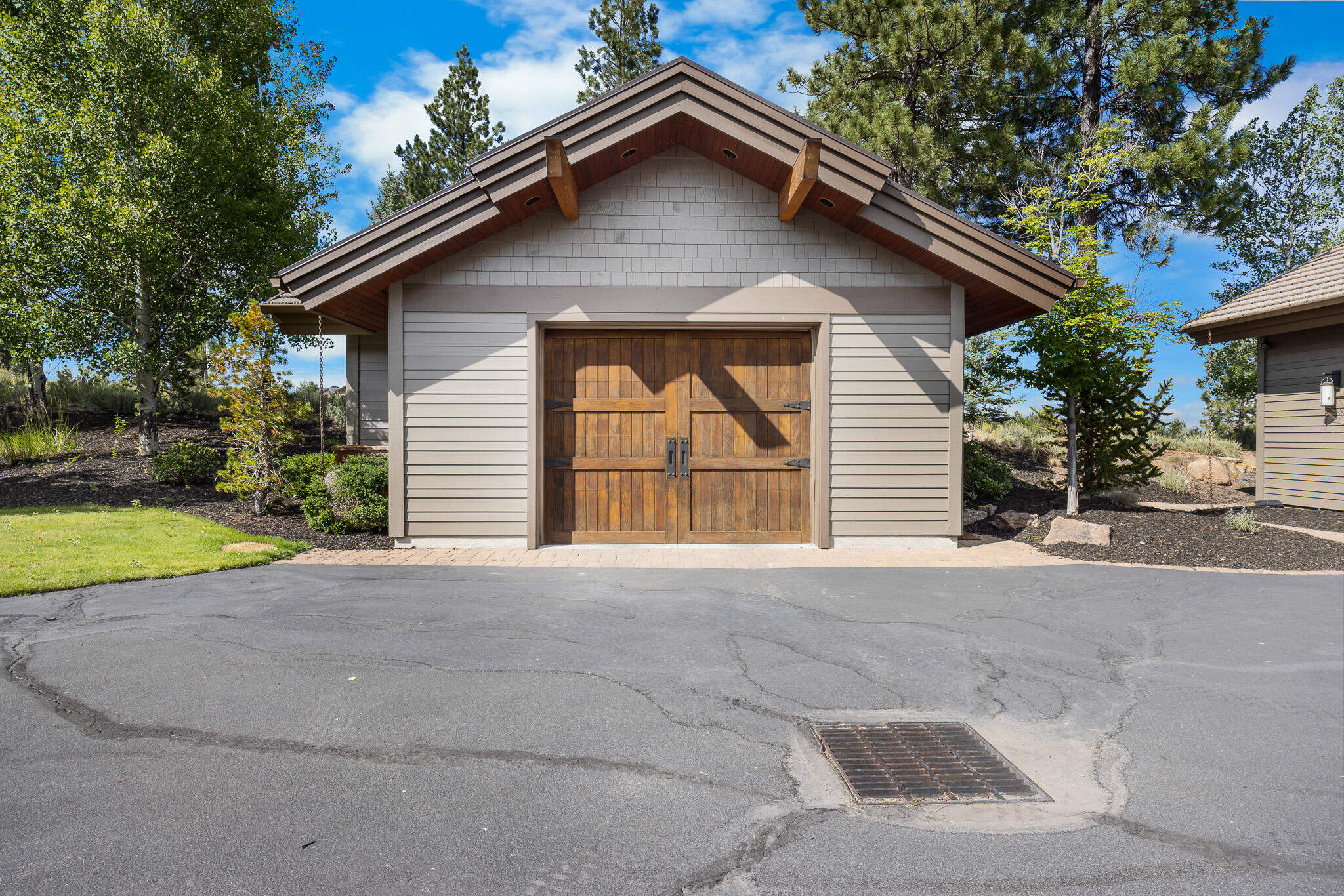 18883 Sutherland Court Bend, OR 97702 - Photo 56 of 70 A separate garage adds flexibility for storage, hobbies, or workshop space.