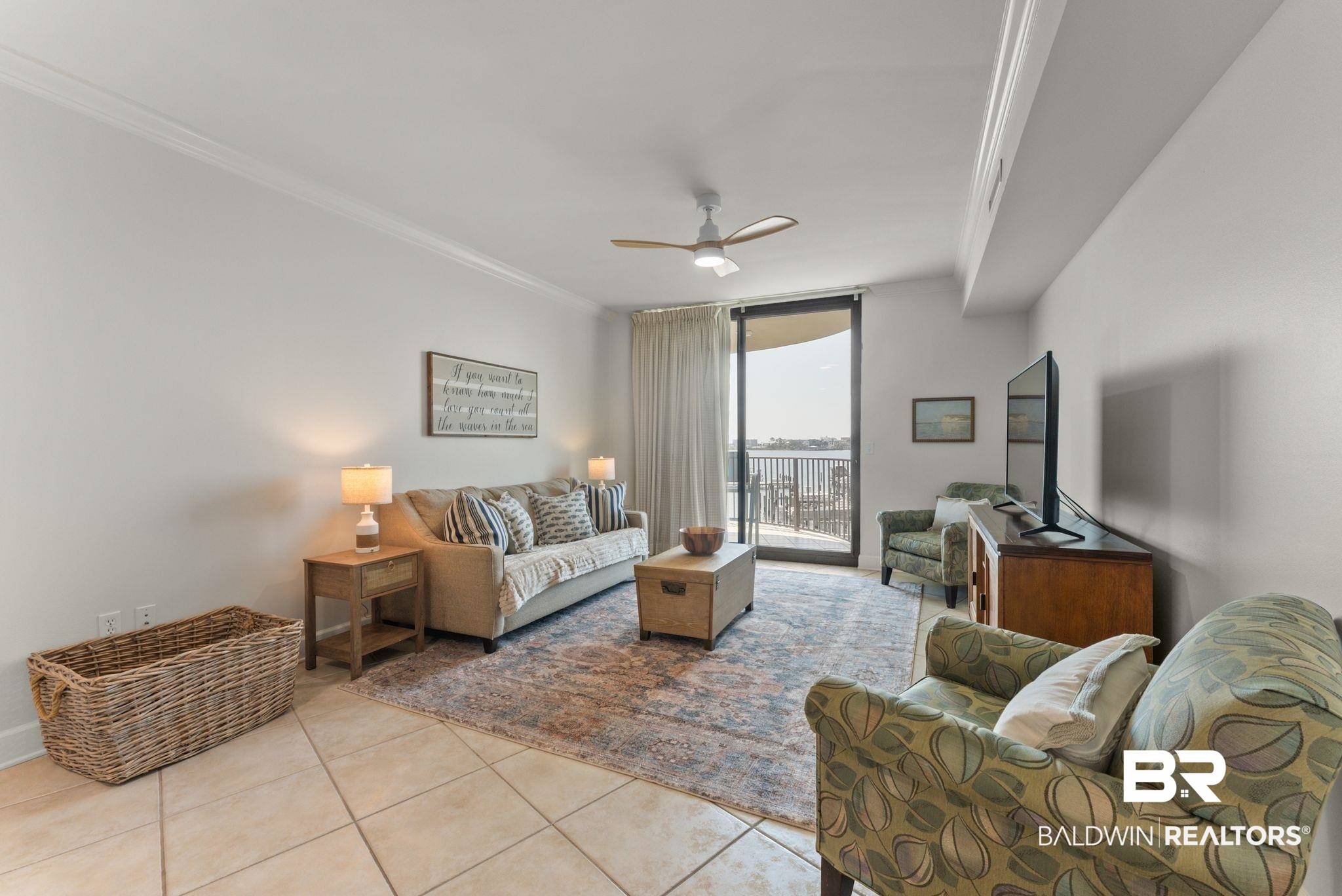 27580 Canal Road, Unit 1233 Orange Beach, AL 36561 - Photo 26 of 79 Living room featuring floor to ceiling windows, ornamental molding, ceiling fan, and light tile patterned flooring