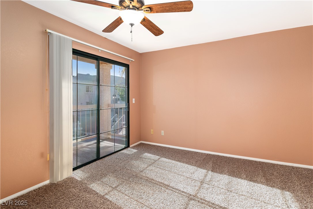 1948 Las Palmas Lane, Unit 277 Laughlin, NV 89029 - Photo 19 of 71 Empty room with carpet and a ceiling fan