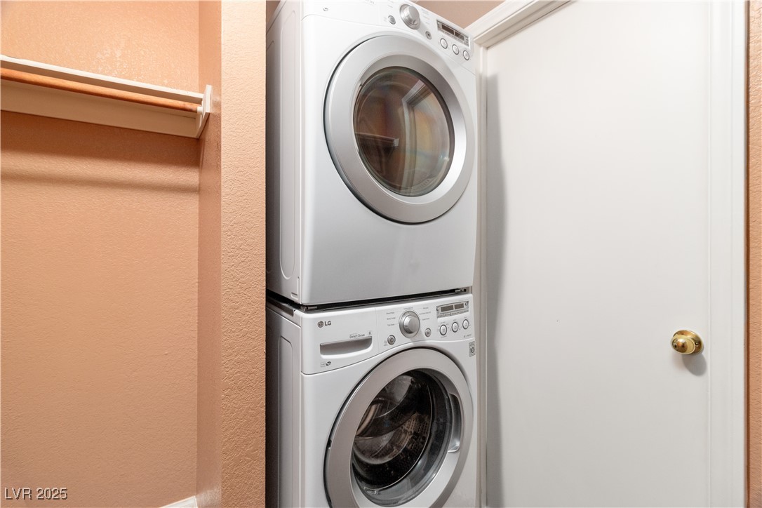 1948 Las Palmas Lane, Unit 277 Laughlin, NV 89029 - Photo 38 of 71 Laundry area inside walk-in closet featuring stacked washer and clothes dryer