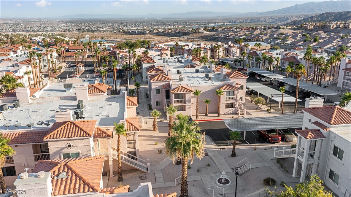 1948 Las Palmas Lane, Unit 277 Laughlin, NV 89029 - Photo 54 of 71 Aerial perspective of suburban area featuring mountains