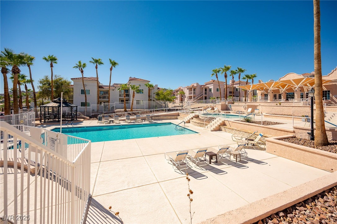 1948 Las Palmas Lane, Unit 277 Laughlin, NV 89029 - Photo 60 of 71 Community pool with a gazebo, a residential view, and a patio
