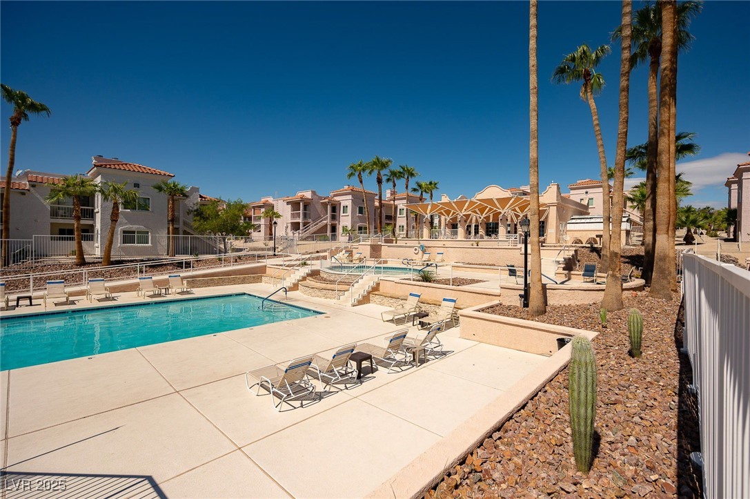 1948 Las Palmas Lane, Unit 277 Laughlin, NV 89029 - Photo 69 of 71 Community pool featuring a residential view and a patio area