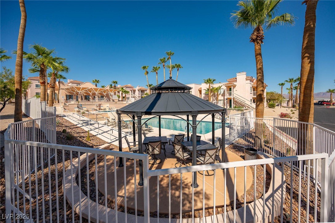 1948 Las Palmas Lane, Unit 277 Laughlin, NV 89029 - Photo 71 of 71 Community pool with a gazebo, a residential view, and a patio