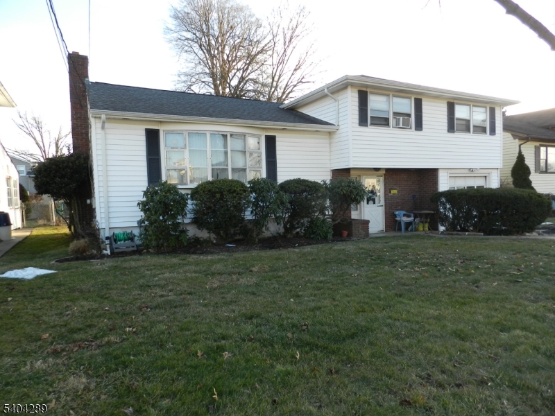 2442 Terrill Road Union, NJ 07083 - Photo 1 of 15 a front view of house with yard and green space