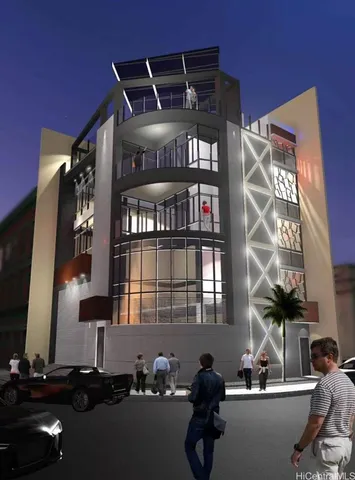 a street sign sitting on top of a wall