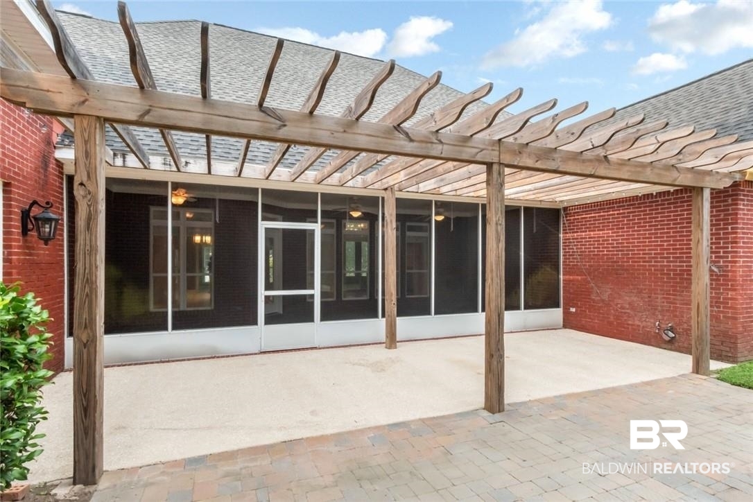 8837 Dawes Lake Road South Mobile, AL 36619 - Photo 14 of 44 View of patio featuring a pergola and a sunroom
