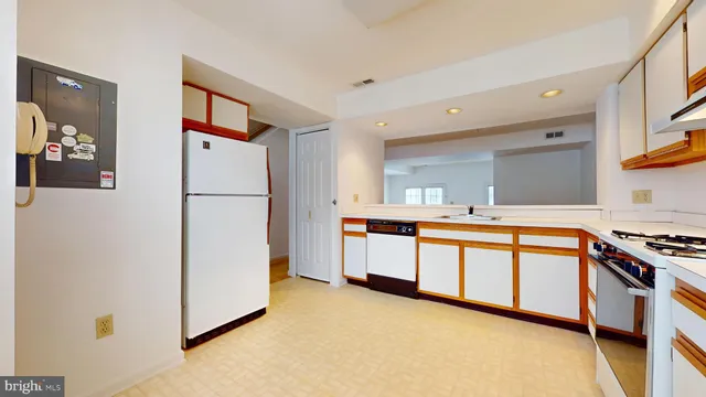 a view of a hallway with stairs