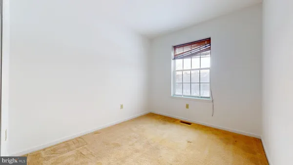 an empty room with closet