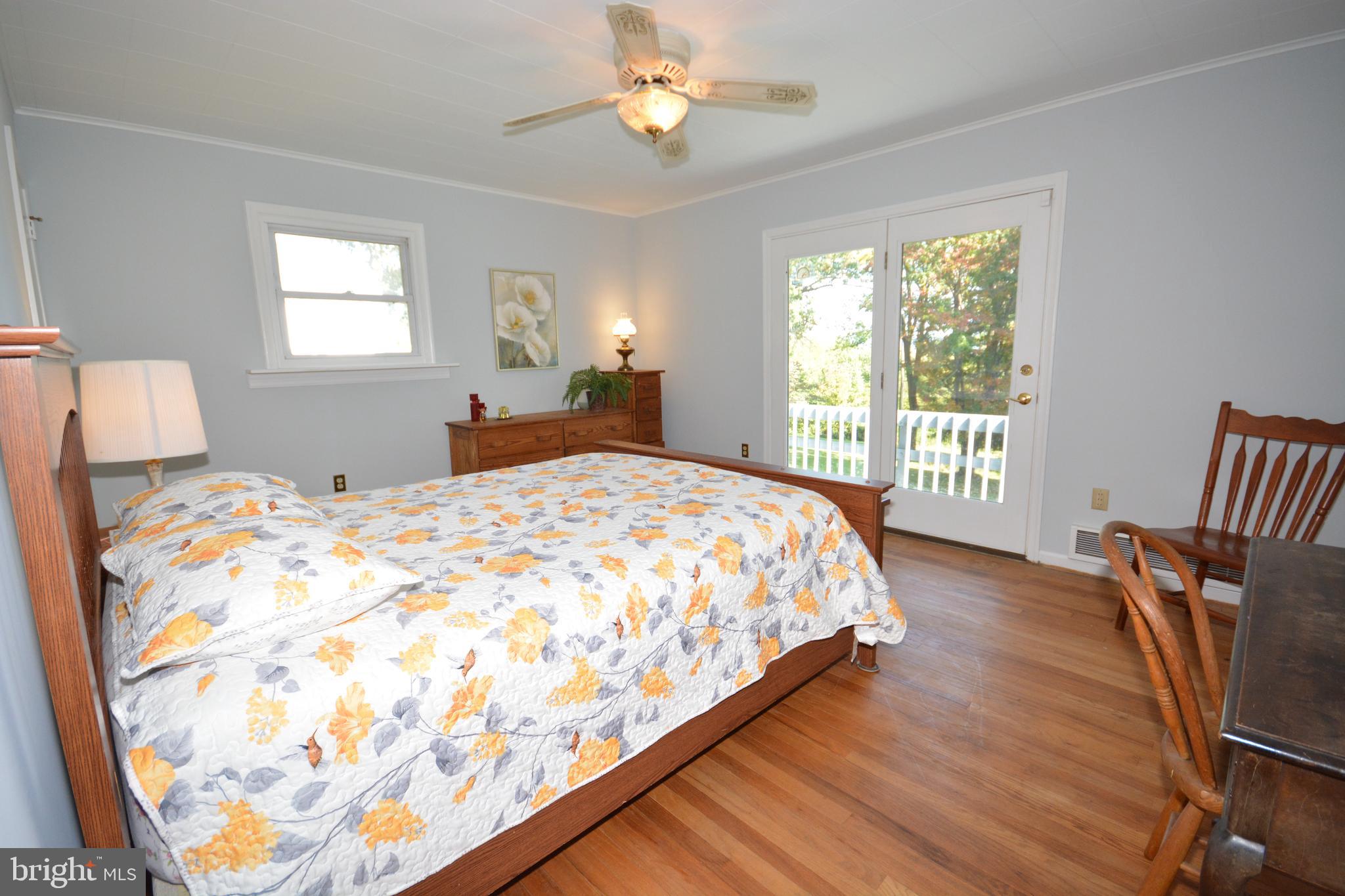 409 Hain Road Reading, PA 19608 - Photo 16 of 38 Bedroom 2 w/ Door to Deck