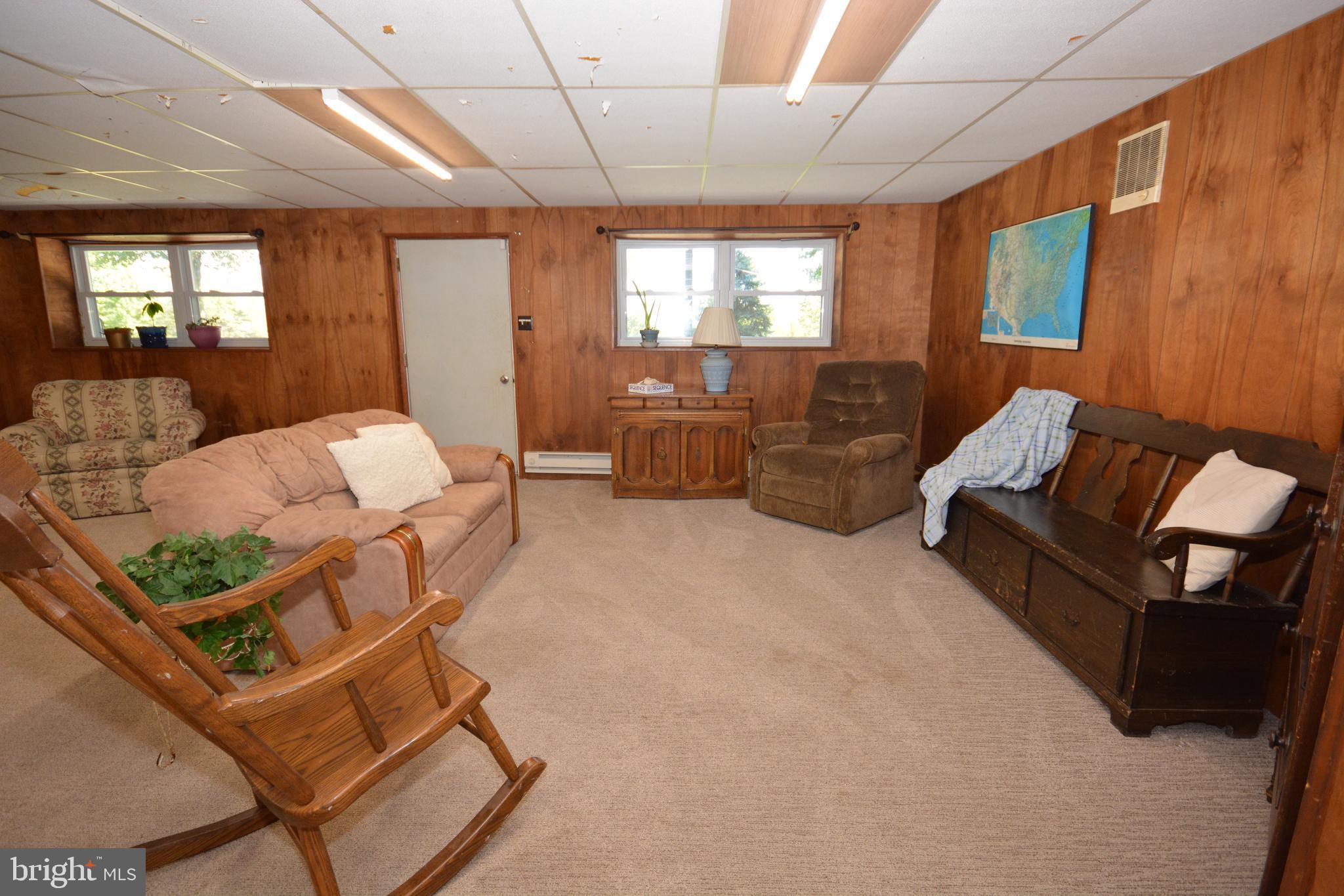 409 Hain Road Reading, PA 19608 - Photo 25 of 38 LL Family Room w/ Door to Rear Yard