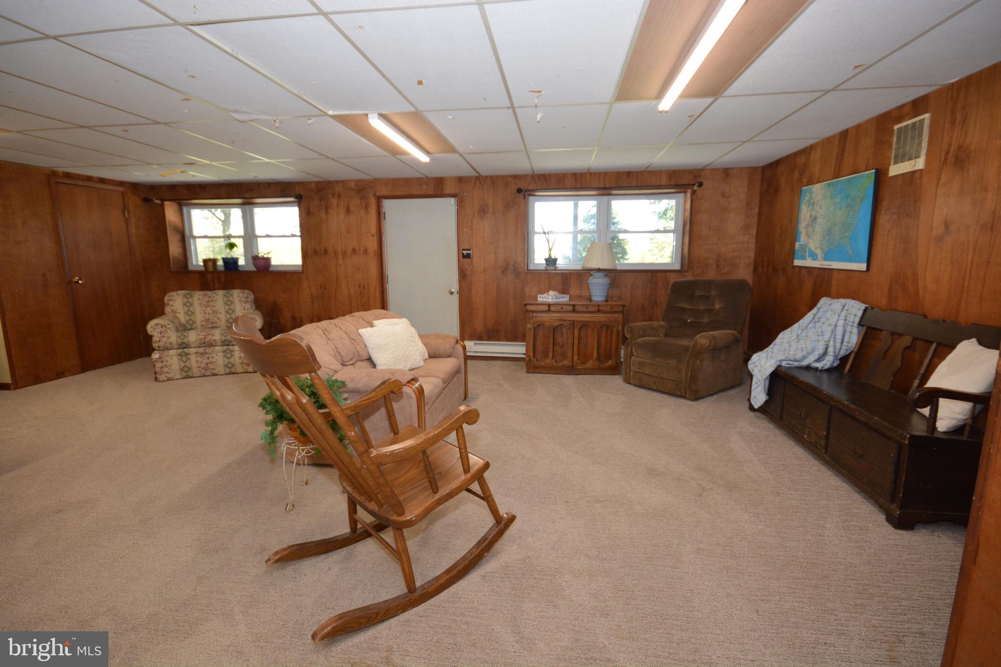 409 Hain Road Reading, PA 19608 - Photo 26 of 38 LL Family Room w/ Door to Rear Yard